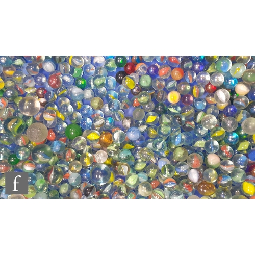 319 - A large collection of various glass marbles, to include swirl, opaque examples of varying colour and... 