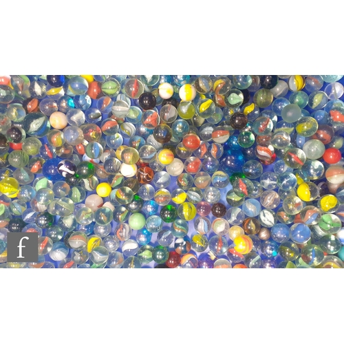 319 - A large collection of various glass marbles, to include swirl, opaque examples of varying colour and... 