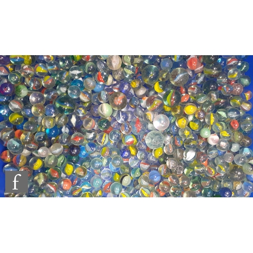 321 - A collection of glass marbles, of varying size and colour mostly swirl design, mostly with bubbles a... 