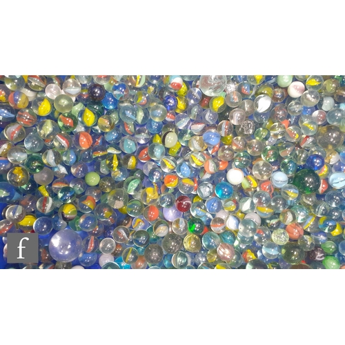 321 - A collection of glass marbles, of varying size and colour mostly swirl design, mostly with bubbles a... 