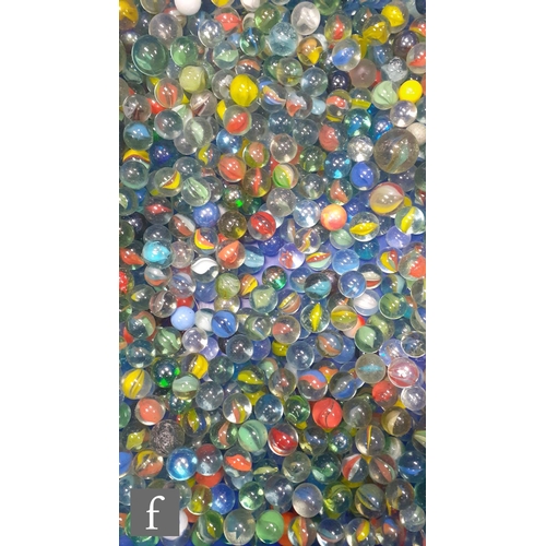 322 - A large collection of glass marbles, of varying size and colour but mainly swirl examples, many with... 