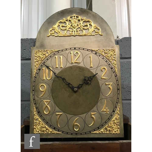 586 - An Edwardian mahogany longcase clock, the Arabic arch dial with matted centre, spandrels and eight d... 