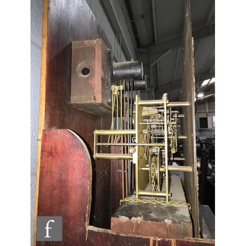 586 - An Edwardian mahogany longcase clock, the Arabic arch dial with matted centre, spandrels and eight d... 