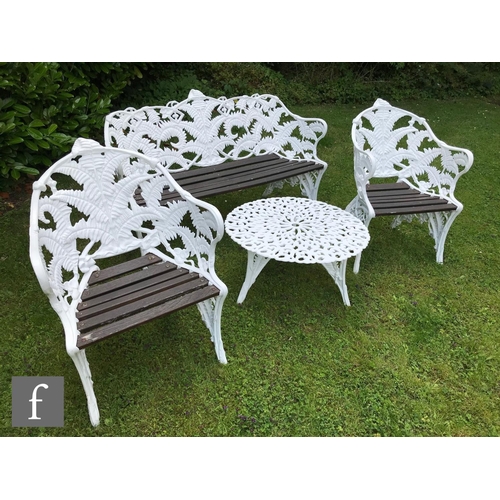 651 - A 20th Century cast alloy suite of garden furniture in the style of Coalbrookdale's Blackberry and F... 