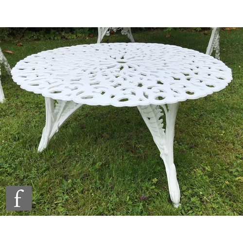 651 - A 20th Century cast alloy suite of garden furniture in the style of Coalbrookdale's Blackberry and F... 