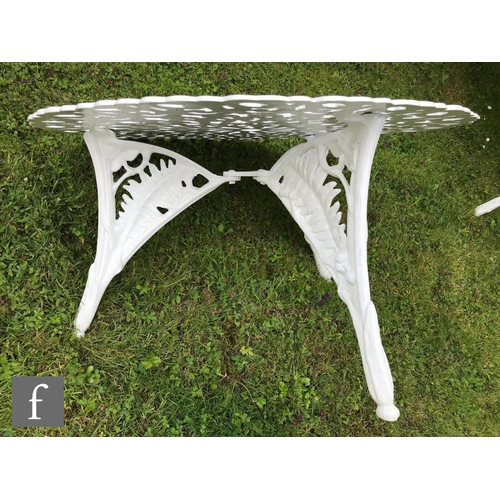 651 - A 20th Century cast alloy suite of garden furniture in the style of Coalbrookdale's Blackberry and F... 