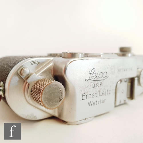 813 - A Leica IIIC rangefinder camera, circa 1941, serial number 368196, Chrome body, with Ernst Leitz Wet... 