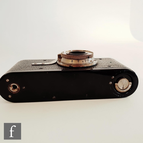 814 - A Leica I (model A) camera, circa 1930, serial number 22149, the black body with black lacquered bra... 