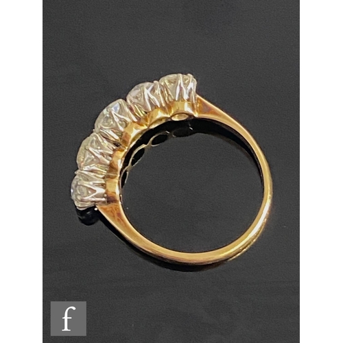 401 - An 18ct diamond five stone ring, graduated claw set old cut stones, total weight approximately 2.40c... 