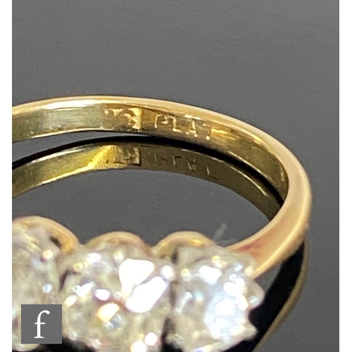 401 - An 18ct diamond five stone ring, graduated claw set old cut stones, total weight approximately 2.40c... 