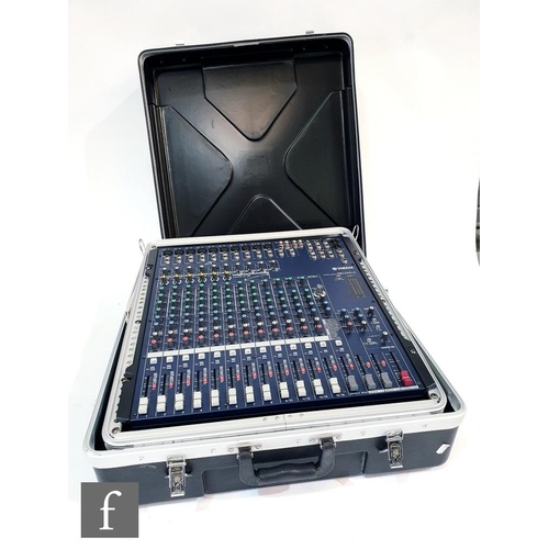 708 - A Yamaha MG 166CX console mixing console, complete with Stagg hard case, together with Peavey Addver... 