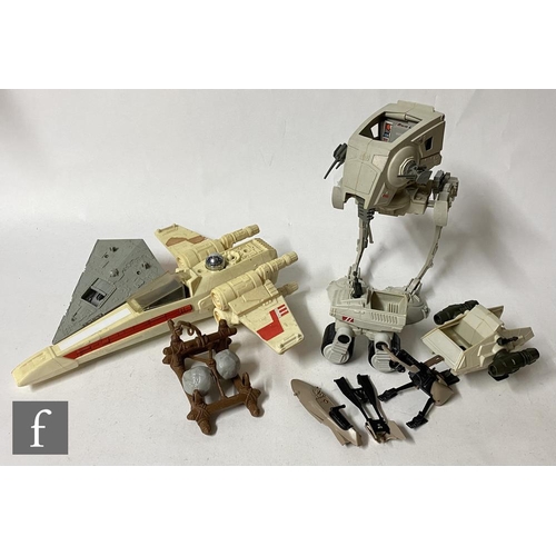 1140 - A collection of Kenner Star Wars vehicles and mini-rigs, to include an X-wing, AT-ST, Ewok Assault C... 