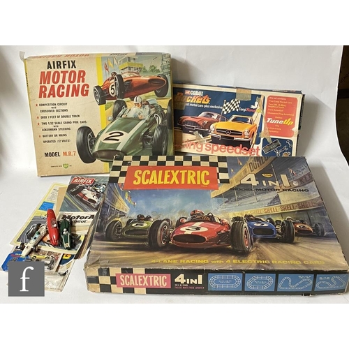 1148 - A collection of assorted slot cars and related items to include two Scalextric C82 Lotus in green an... 