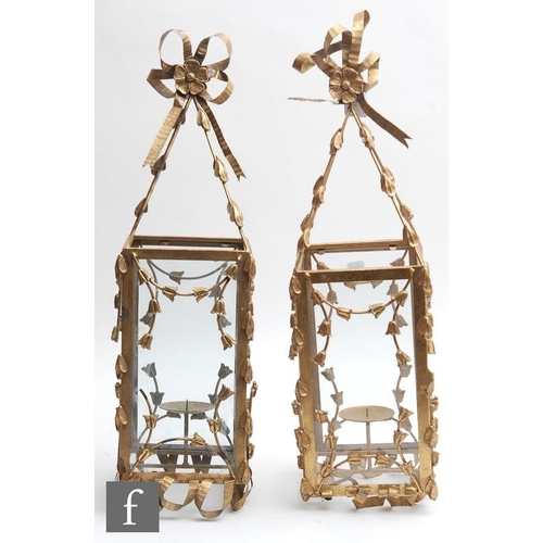 1852 - A pair of gilt metal and glass hanging lanterns, the four glass square section shades, applied with ... 