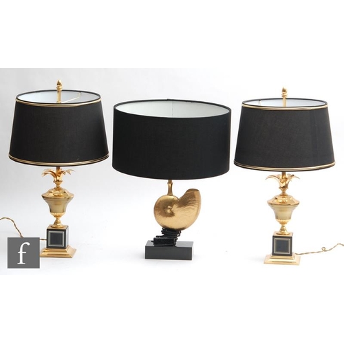 1859 - A collection of gilt metal table lamps, to include a pair of classical urn form examples, raised on ... 