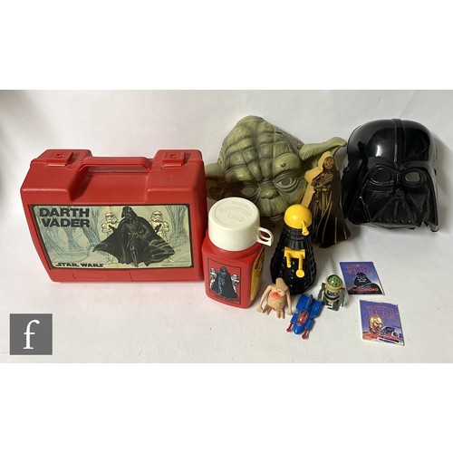 1141 - A collection of television and film related toys and other items, to include a Thermos Star Wars Rou... 