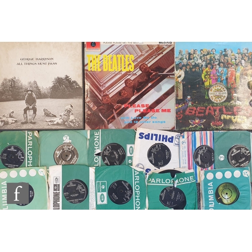 669 - A collection of Beatles LPs and 7 inch singles, to include Please, Please Me LP, PMC 1202, third pre... 