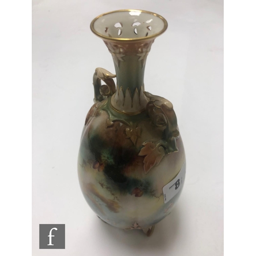 8 - An early 20th Century Royal Worcester vase of gourd form with an applied moulded foot and shaped han... 