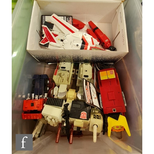 1121 - A collection of Habsro Transformers, all G1, to include Metroplex (complete besides small laser pist... 