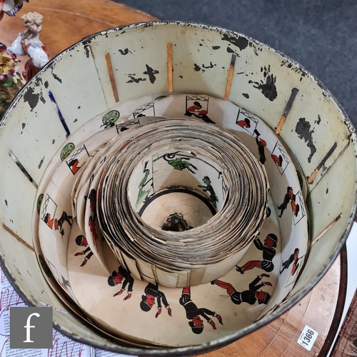 1143 - A late 19th to early 20th Century 'Wheel of Life' Zoetrope, the black lacquer exterior with painted ... 