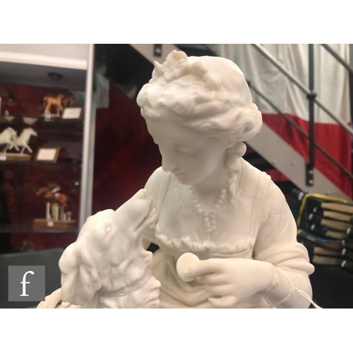 80 - A 19th Century Parian figure of a lady sat offering her dog a biscuit, unmarked, height 35cm.