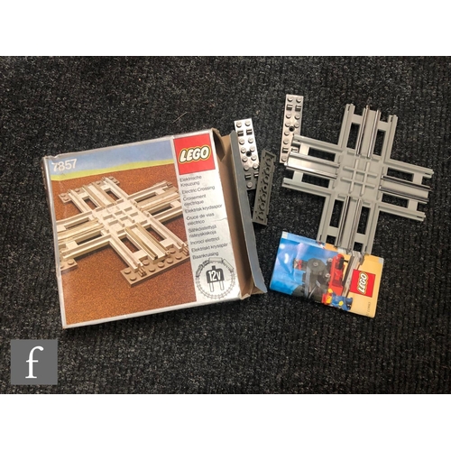 1128 - A collection of Lego railway items, 7740 InterCity Passenger Train, 7730 Electric Goods Train, 7857 ... 