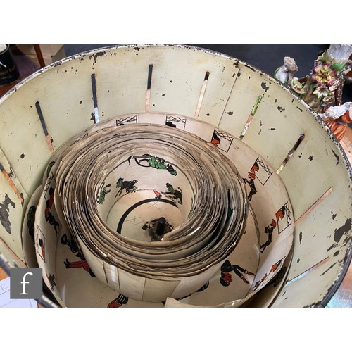 1143 - A late 19th to early 20th Century 'Wheel of Life' Zoetrope, the black lacquer exterior with painted ... 