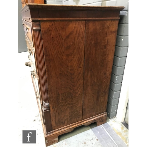 618 - A George III oak and mahogany crossbanded chest of two short and three long drawers, brass drop hand... 