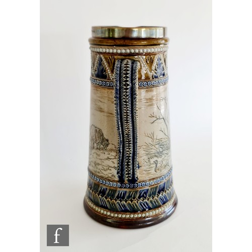 13 - A late 19th Century Doulton Lambeth jug decorated by Hannah Barlow with an incised band showing two ... 