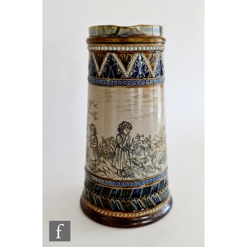 13 - A late 19th Century Doulton Lambeth jug decorated by Hannah Barlow with an incised band showing two ... 