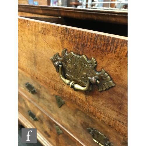 633 - An 18th Century rosewood crossbanded walnut straight front chest of two short and three long drawers... 