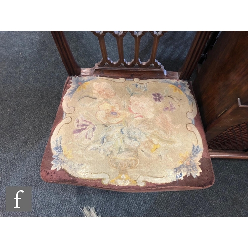 642 - A George III mahogany standard chair, the four pierced splats below a bow top rail, floral tapestry ... 