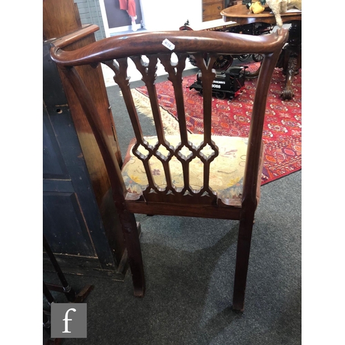 642 - A George III mahogany standard chair, the four pierced splats below a bow top rail, floral tapestry ... 