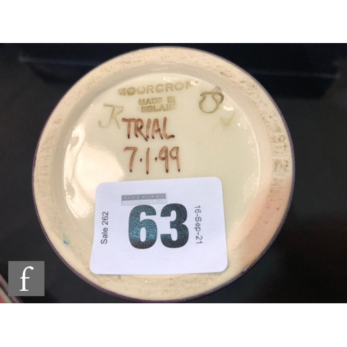 63 - A Moorcroft Pottery Trial vase decorated in a variant of the Ryden Lane pattern designed by Rachel B... 