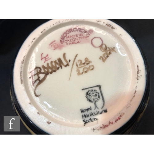 64 - A Moorcroft Pottery ginger jar and cover decorated in the Ashwood Gold pattern designed by Emma Boss... 