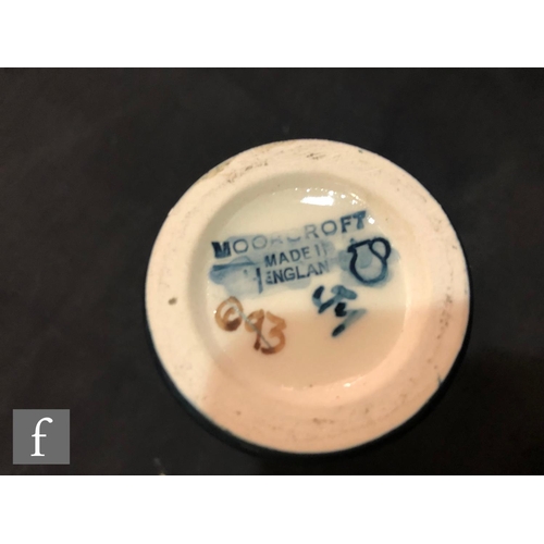 65 - A small Moorcroft Pottery vase decorated in the Oberon pattern designed by Rachel Bishop, impressed ... 