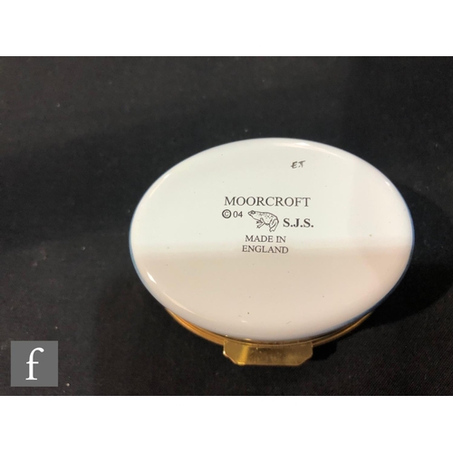 70 - A Moorcroft Enamels Collectors Club oval box and cover decorated in the Shintaki pattern designed by... 