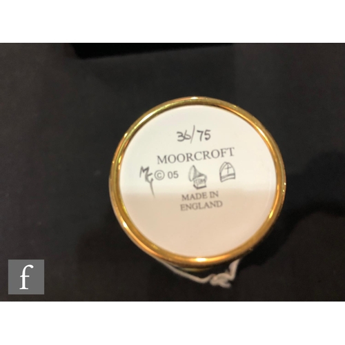 71 - A Moorcroft Enamels vase decorated in the Daffodil Delight pattern designed by Marie Graves, printed... 