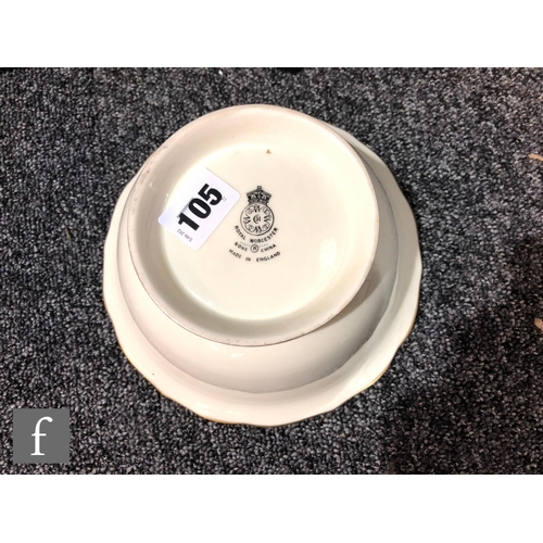 105 - A Royal Worcester Fallen Fruits high sided bowl decorated to the interior by Freeman with hand paint... 