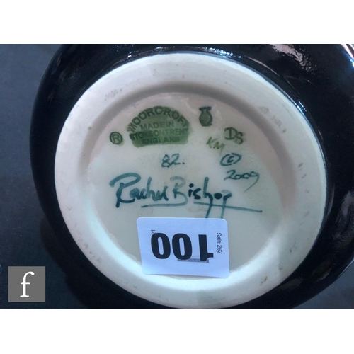 100 - A Moorcroft Pottery vase of compressed globe and shaft form decorated in the Florian Flame pattern d... 