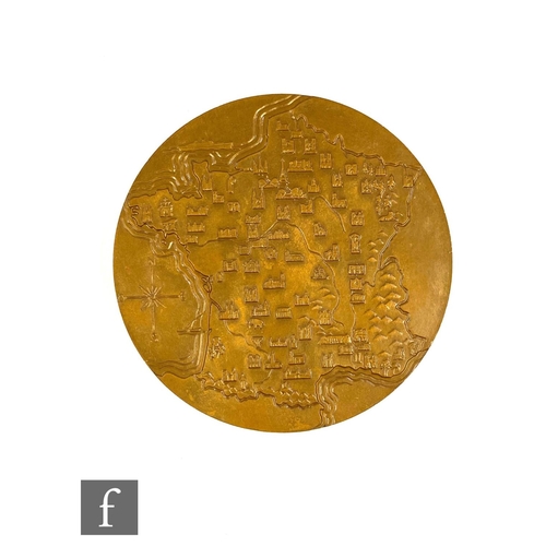 642 - Pierre Turin - A French circular brass plaque depicting a female profile with key monuments to front... 