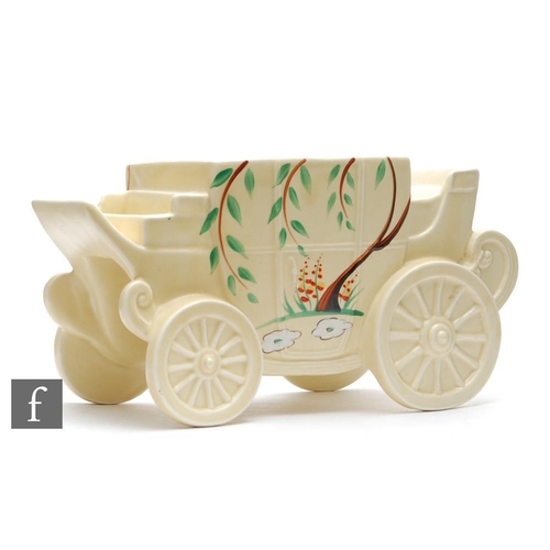 529 - Clarice Cliff - Dryday - A novelty cigarette box modelled as a horse drawn carriage circa 1936, deco... 