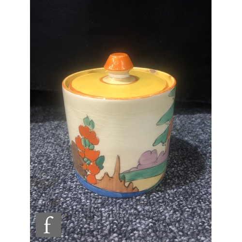 299 - Clarice Cliff - Orange Roof Cottage - A drum shaped preserve pot and cover circa 1932, hand painted ... 