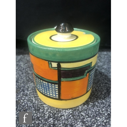 377 - Clarice Cliff - Football - A drum shaped preserve pot and cover circa 1930, hand painted with an abs... 