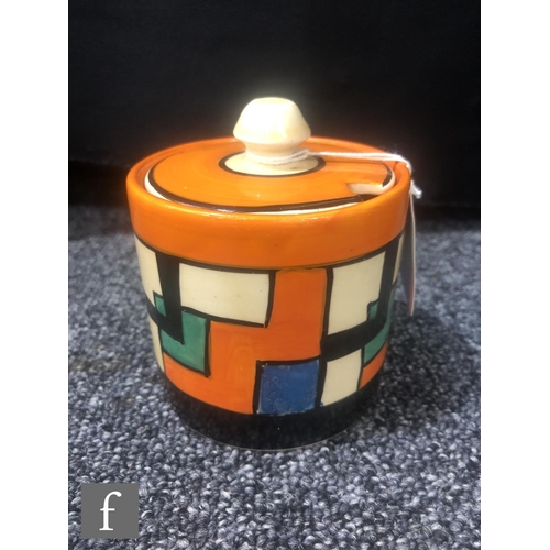 379 - Clarice Cliff - Mondrian - A drum shaped preserve pot and cover circa 1929, hand painted with an int... 