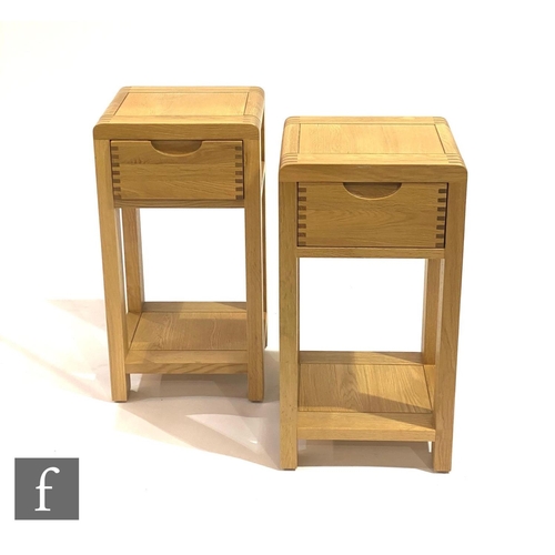 1499 - Ercol Furniture - A pair of light oak Bosco range compact side or lamp tables, each fitted with a si... 