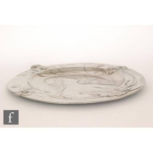 9a - WMF (Wurttembergische Metallwarenfabrik) - An early 20th Century circular pewter charger in the Art ... 