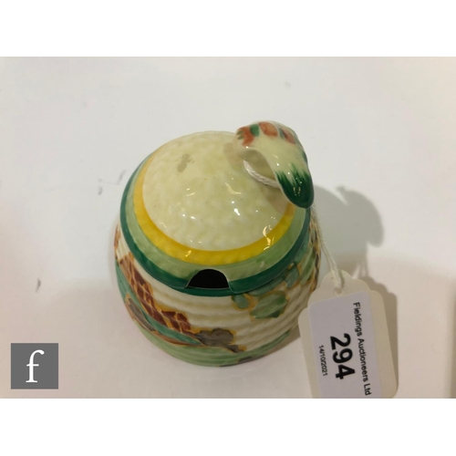 294 - Clarice Cliff - Secrets - A small size Beehive honey pot circa 1933, hand painted with a tree and co... 