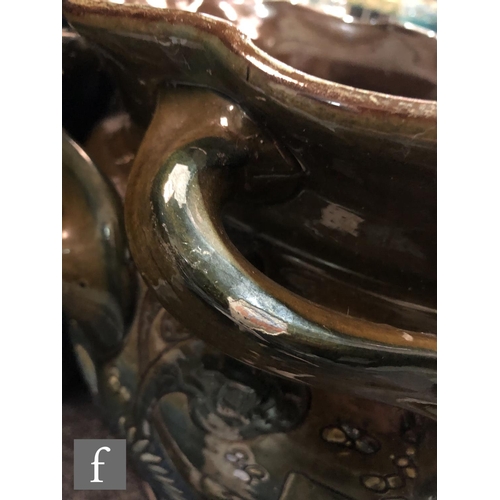 91 - C H Brannam - Barum - An early 20th Century hand thrown jardinière of shouldered ovoid form with a f... 