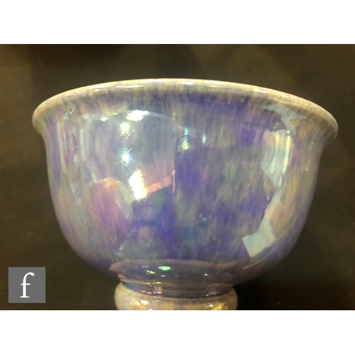 117 - Ruskin Pottery - A small footed bowl decorated in an all over lavender lustre, impressed mark and da... 